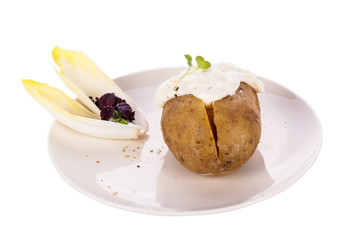 Baked jacket potato with sour cream sauce