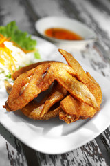 close up thai chicken fried in white dish