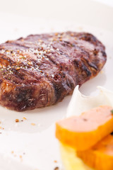 Grilled beef steak with seasoning
