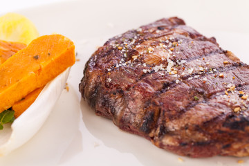 Grilled beef steak with seasoning