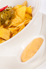 Nachos with cheese sauce and chilli pepperoni