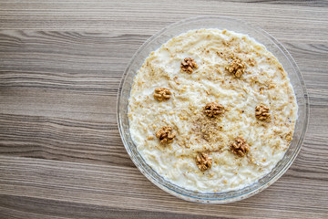 Gullac, Turkish Traditional Milk Dessert on wooden Background