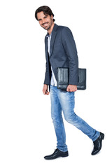 Fototapeta premium Handsome stylish man carrying a briefcase