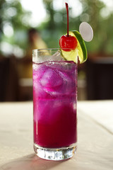 close up blueberry and cherry juice in glass