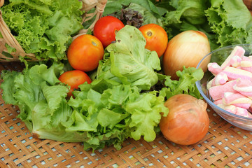Vegetables salad, tomato and pink marshmallows.