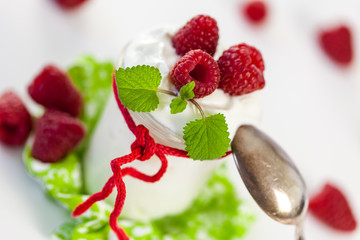 Raspberries and yoghurt or clotted cream