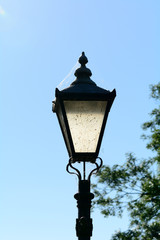 Fototapeta na wymiar Old style lamppost with cobwebs