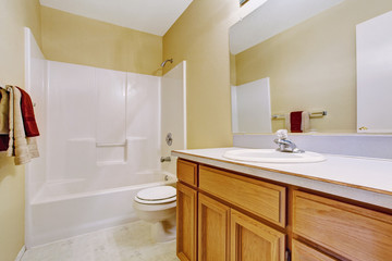 Fototapeta na wymiar Empty bathroom interior in soft ivory