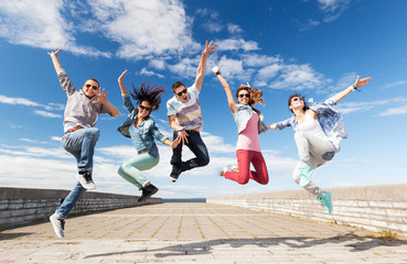 group of teenagers jumping