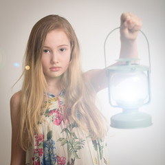 Blond Girl Holding a Lantern.