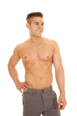 Fototapeta premium man slacks no shirt look side