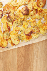 Homemade potato chips on table, close up