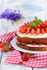 Delicious biscuit cake with strawberries