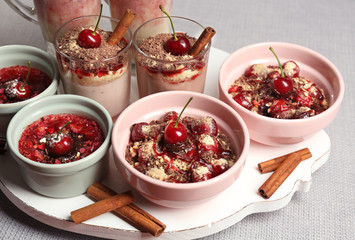 Tasty cherry dessert on table