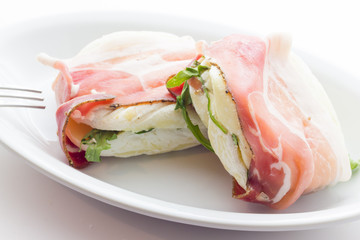 Tomino cheese with bacon