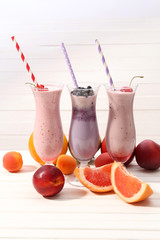 Delicious milkshakes on table, close-up