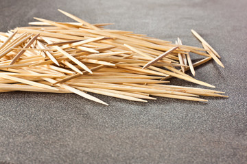 toothpicks on wood background