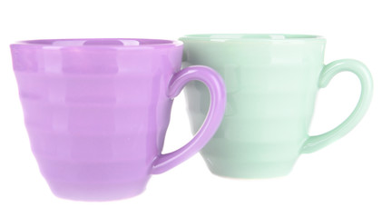 Bright cups isolated on white