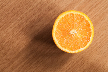 Fresh oranges on wooden table.
