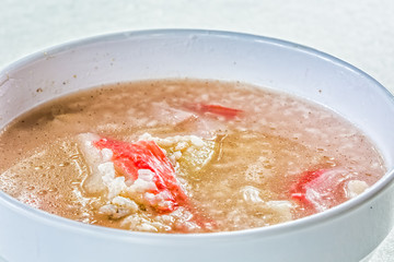 soft-boiled rice with fish and imitation crabmeat