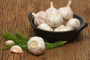Organic garlic on the wooden background