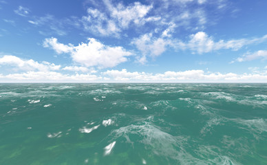 blue sea and cloudy sky over it 