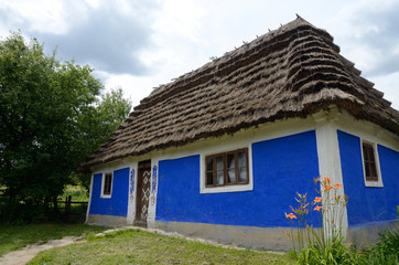 Fototapeta na wymiar Traditional old clay Ukrainian rural house - homestead,Kiev