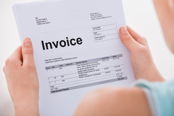 Obraz premium Woman Holding Invoice