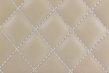 Textured and pattern of  light brown leather.