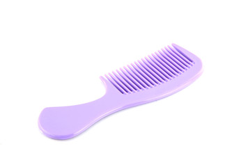 purple combed tool on white background.