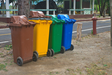 Different colorful recycle bins