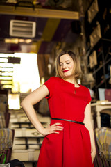 coquettish girl in red