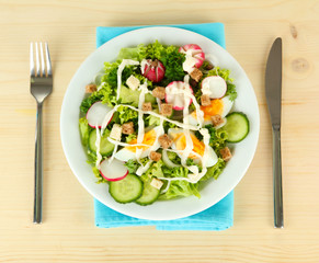 Fresh mixed salad with eggs, salad leaves and other vegetables,