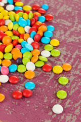 Fototapeta na wymiar Colorful candies on bright background