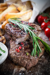 Beef steak on wooden table
