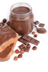 Sweet chocolate cream in jar isolated on white