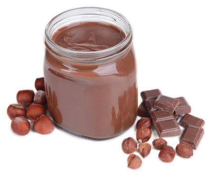Sweet chocolate cream in jar isolated on white