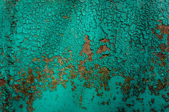 Old Cracked Green Metal Coating. Rusty Sheet Vintage Grunge Damaged