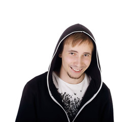 Young happy handsome man in black hoodies looks at camera