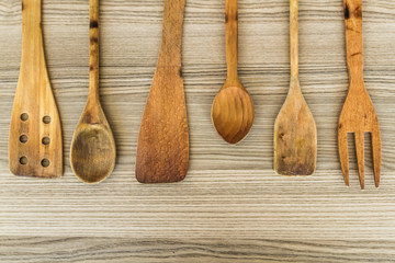 Kitchen wooden utensil of scapula, spoon and fork