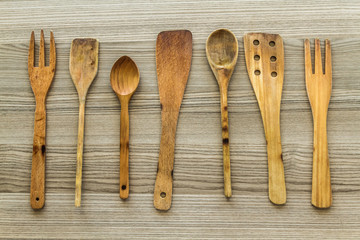 Kitchen wooden utensil of scapula, spoon and fork