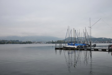 Fototapeta na wymiar Ships on harbour in Luzern lake
