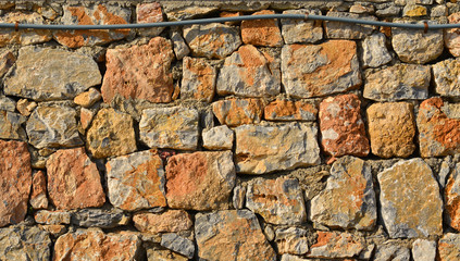 Wall of natural bricks