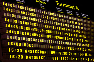 Fototapeta premium Flights information board in airport terminal