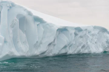 Rolgordijnen Detail of an iceberg © Arrlfx