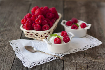 dessert from cottage cheese and raspberries on a white napkin on