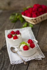 dessert from cottage cheese and raspberries on a white napkin
