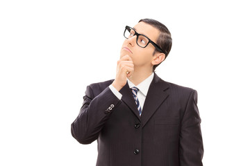 Businessman deep in thought isolated on white