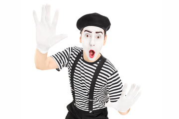 Male actor mimicking with hands