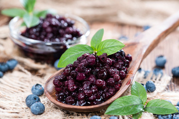 Wooden Spoon with canned Blueberries